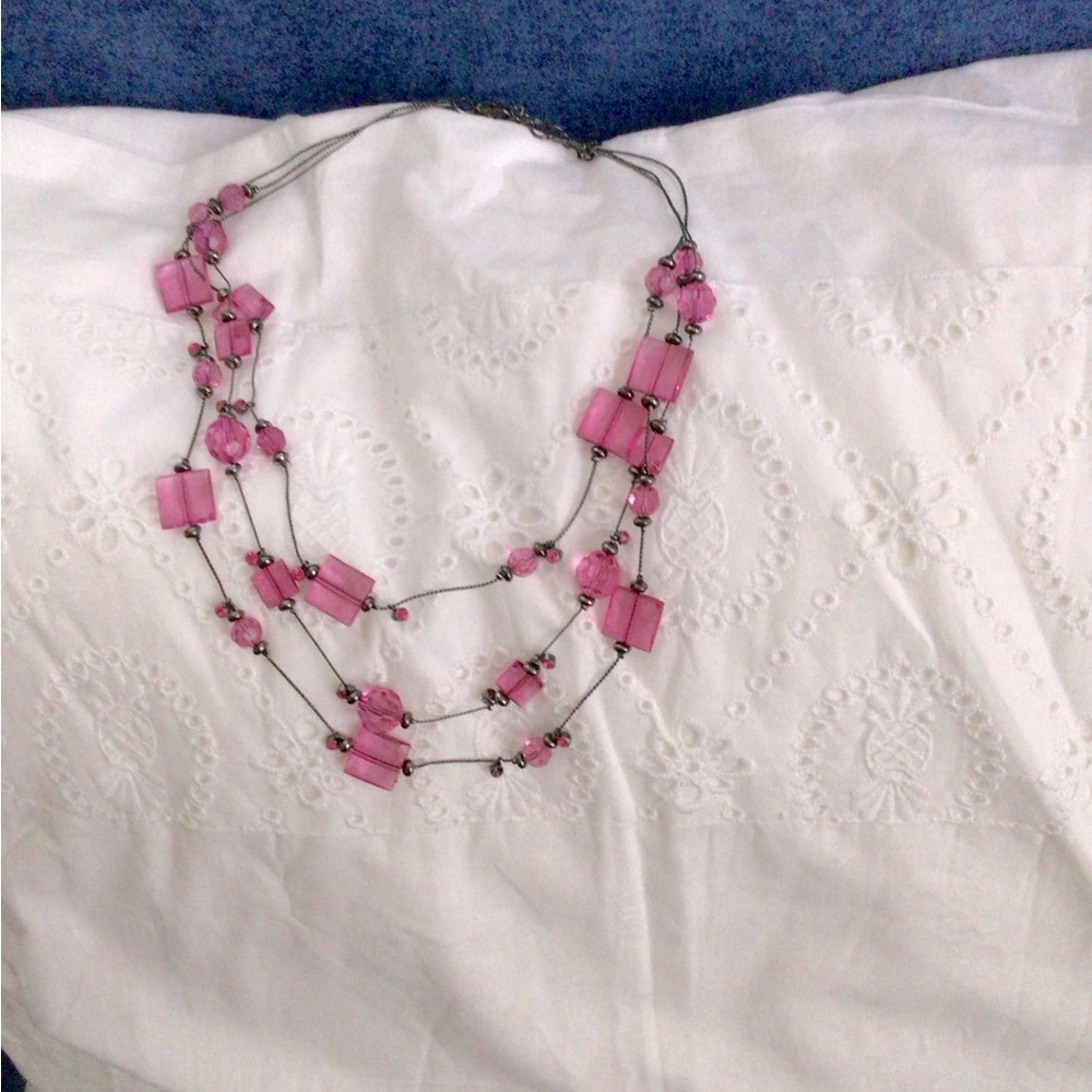 Woman’s pink choker